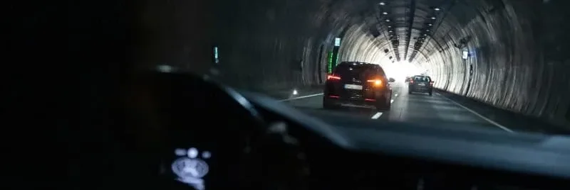 Car driving through a dark tunnel — a high-dynamic-range scene